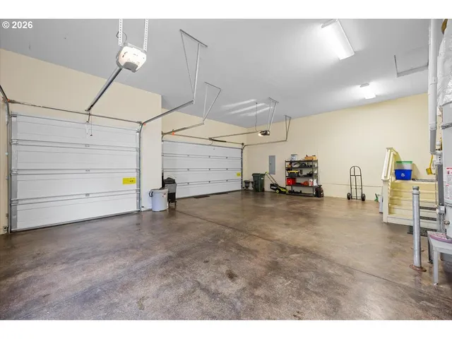 a view of a livingroom with furniture and hardwood floor