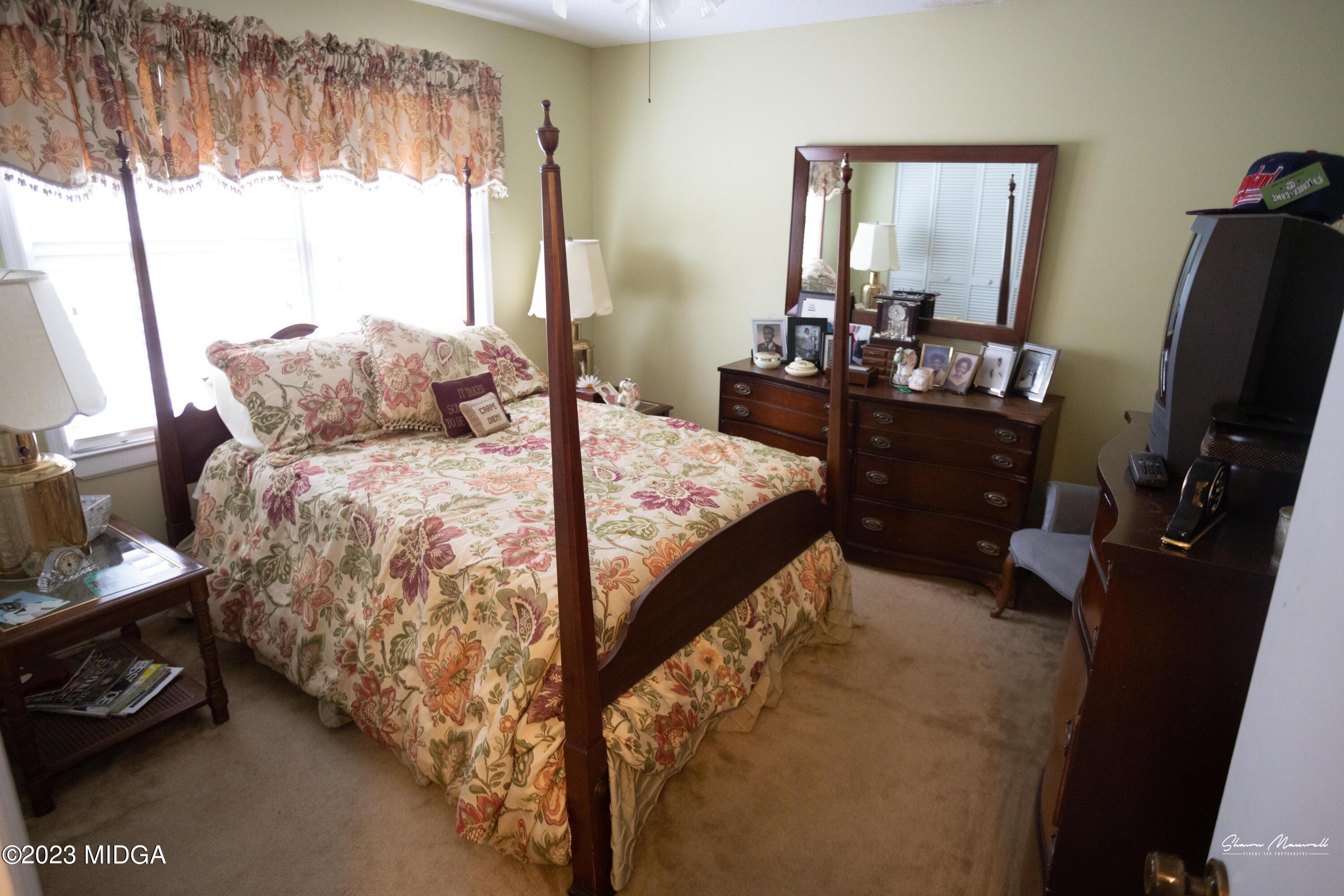 2885 Portland Place Macon, GA 31211 - Photo 26 of 26 a bed room with a bed and a dresser