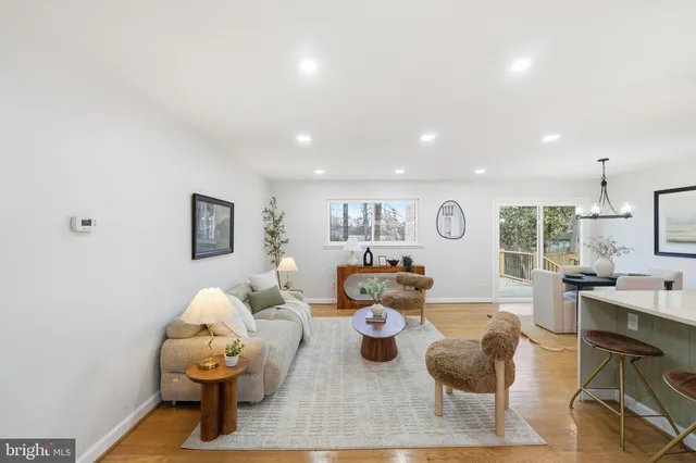 a bedroom with a bed and a painting