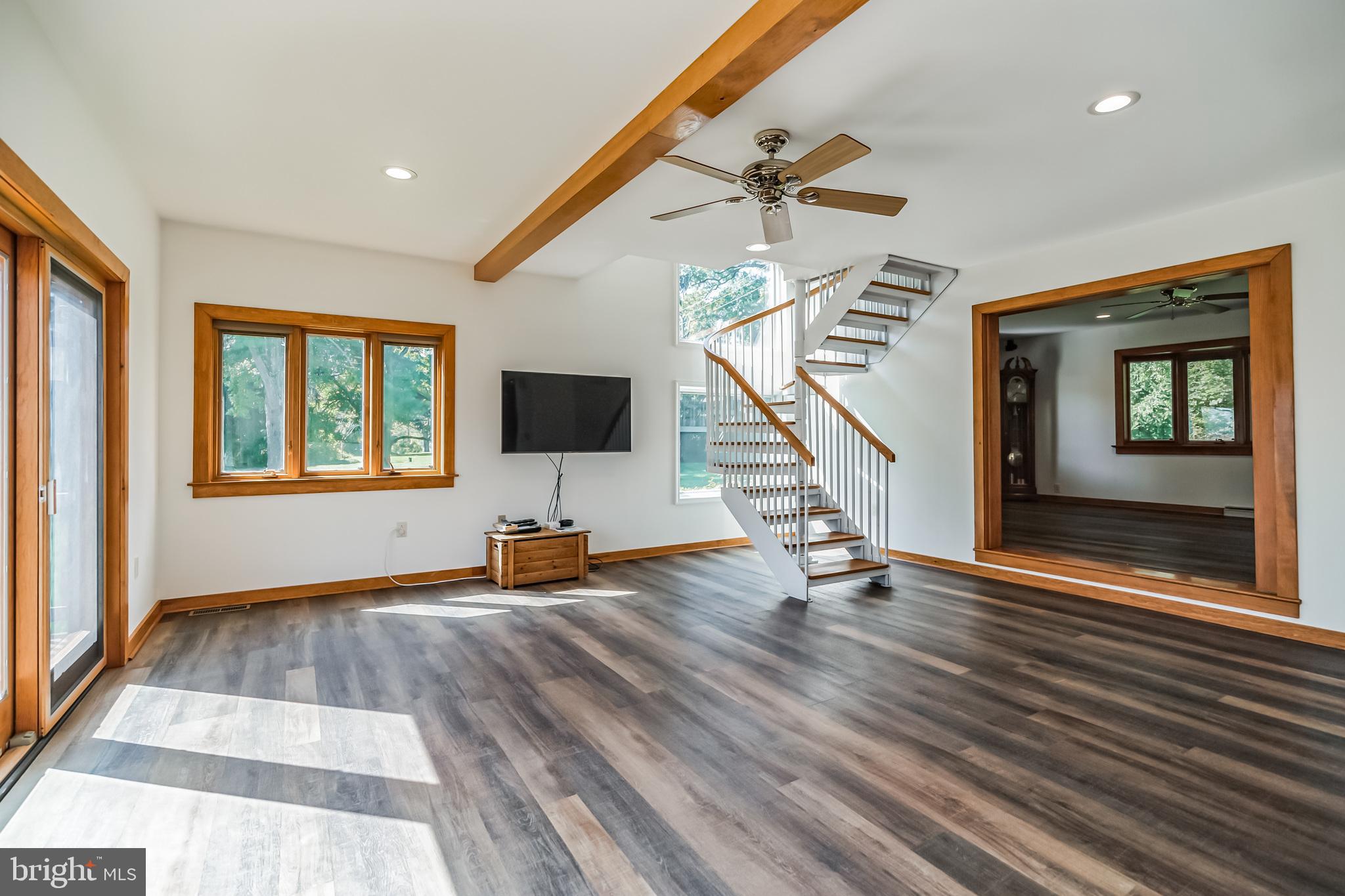 5922 Stoney Hill Road New Hope, PA 18938 - Photo 13 of 47 Family Room with exposed beam and 2nd staircase