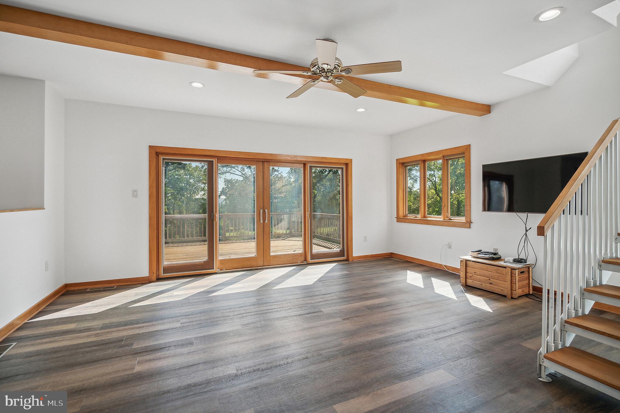5922 Stoney Hill Road New Hope, PA 18938 - Photo 16 of 47 Sunny Family room opens to large deck