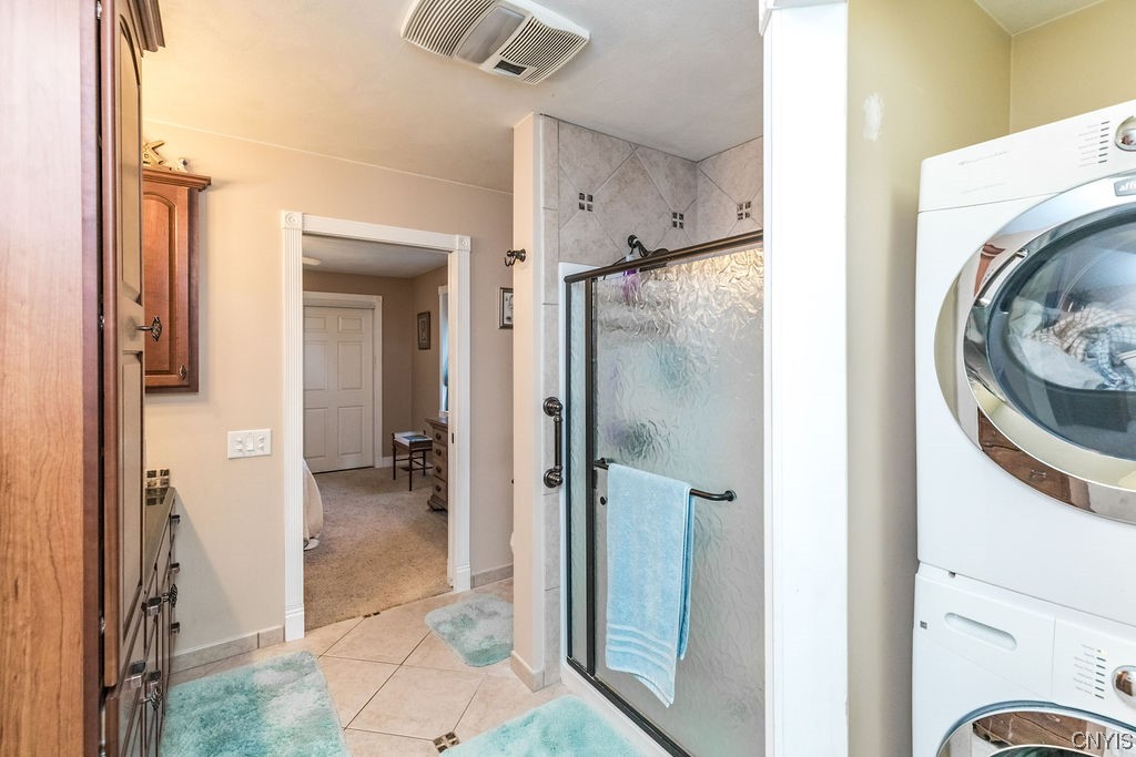 8911 Plainville Road Lysander, NY 13027 - Photo 11 of 43 With laundry area attached to the primary bath