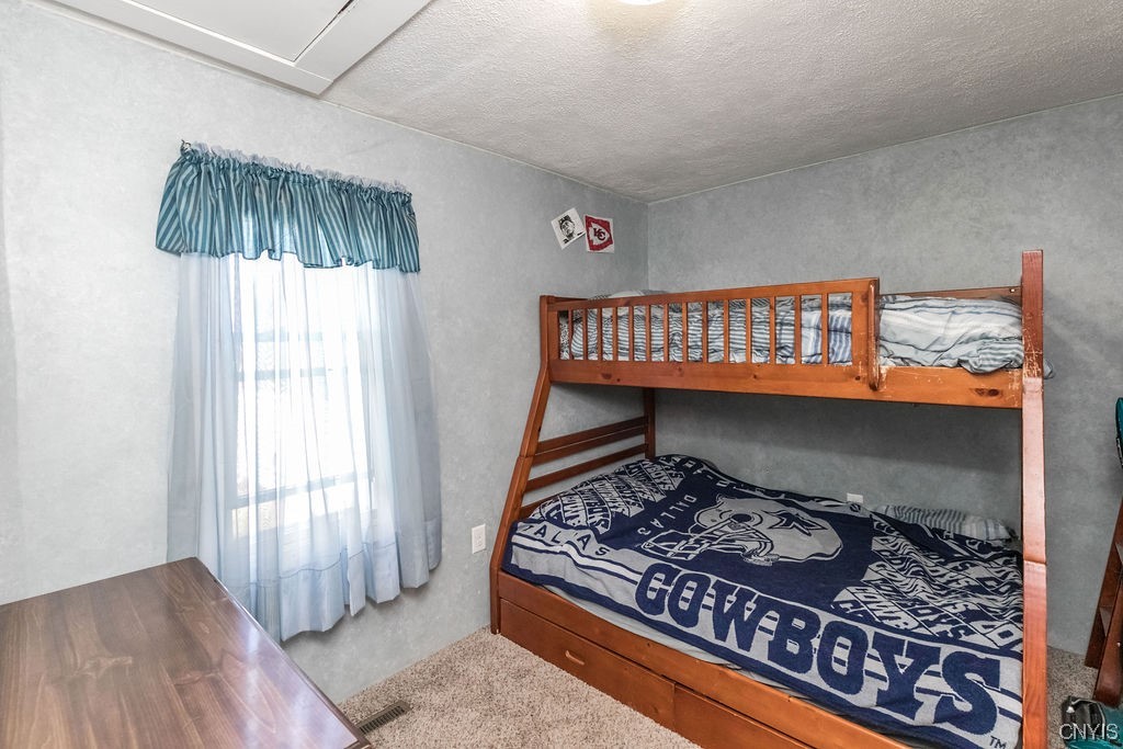 8911 Plainville Road Lysander, NY 13027 - Photo 12 of 43 Second bedroom