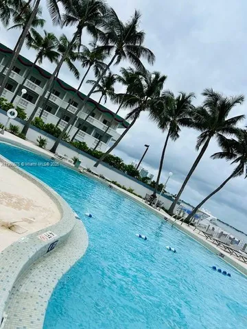 a view of a hallway with a room