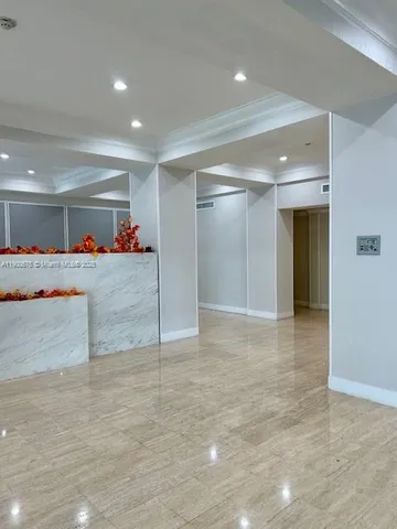 a room with gym equipment and a large window