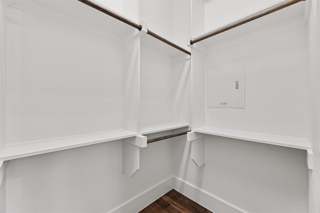 7854 Element Avenue Plano, TX 75024 - Photo 29 of 38 Walk in closet with dark wood-type flooring
