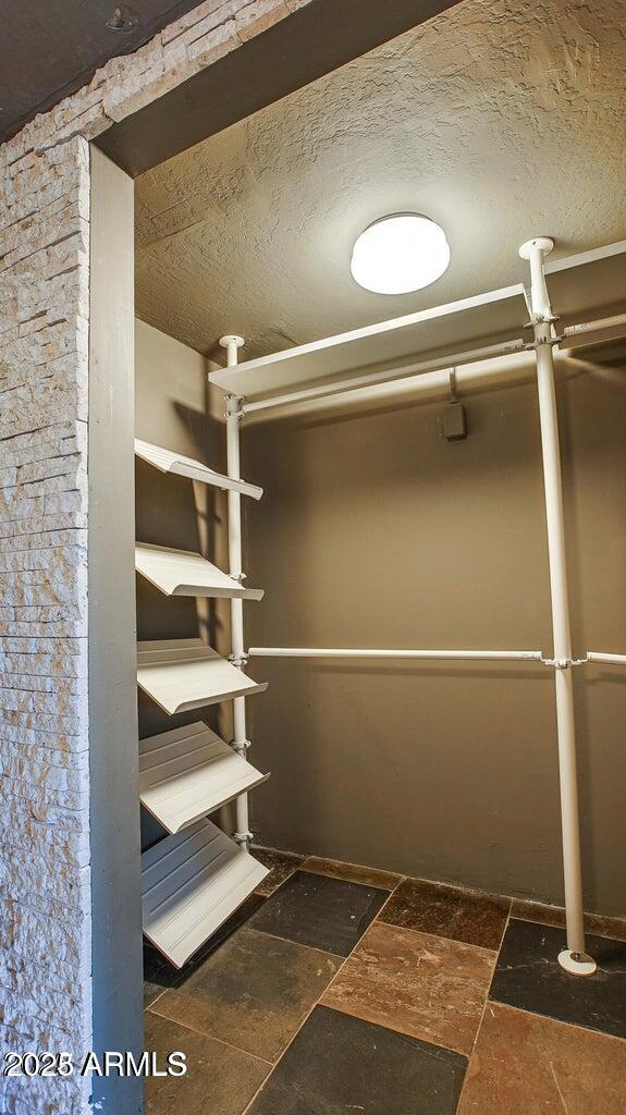 902 West Verde Lane Phoenix, AZ 85013 - Photo 22 of 44 a view of a room with rack on the wall