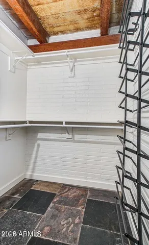 a view of a house with a backyard and a patio