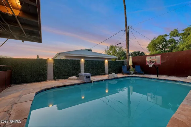 a view of a backyard with plants