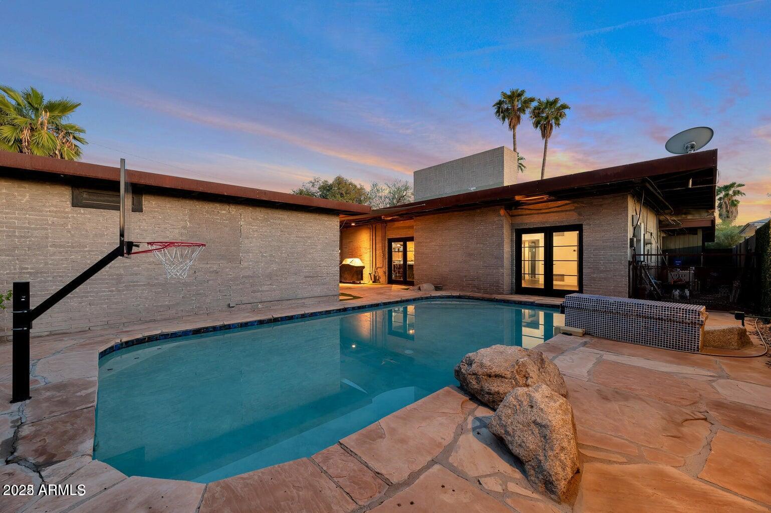 902 West Verde Lane Phoenix, AZ 85013 - Photo 33 of 44 a front view of a house with garden
