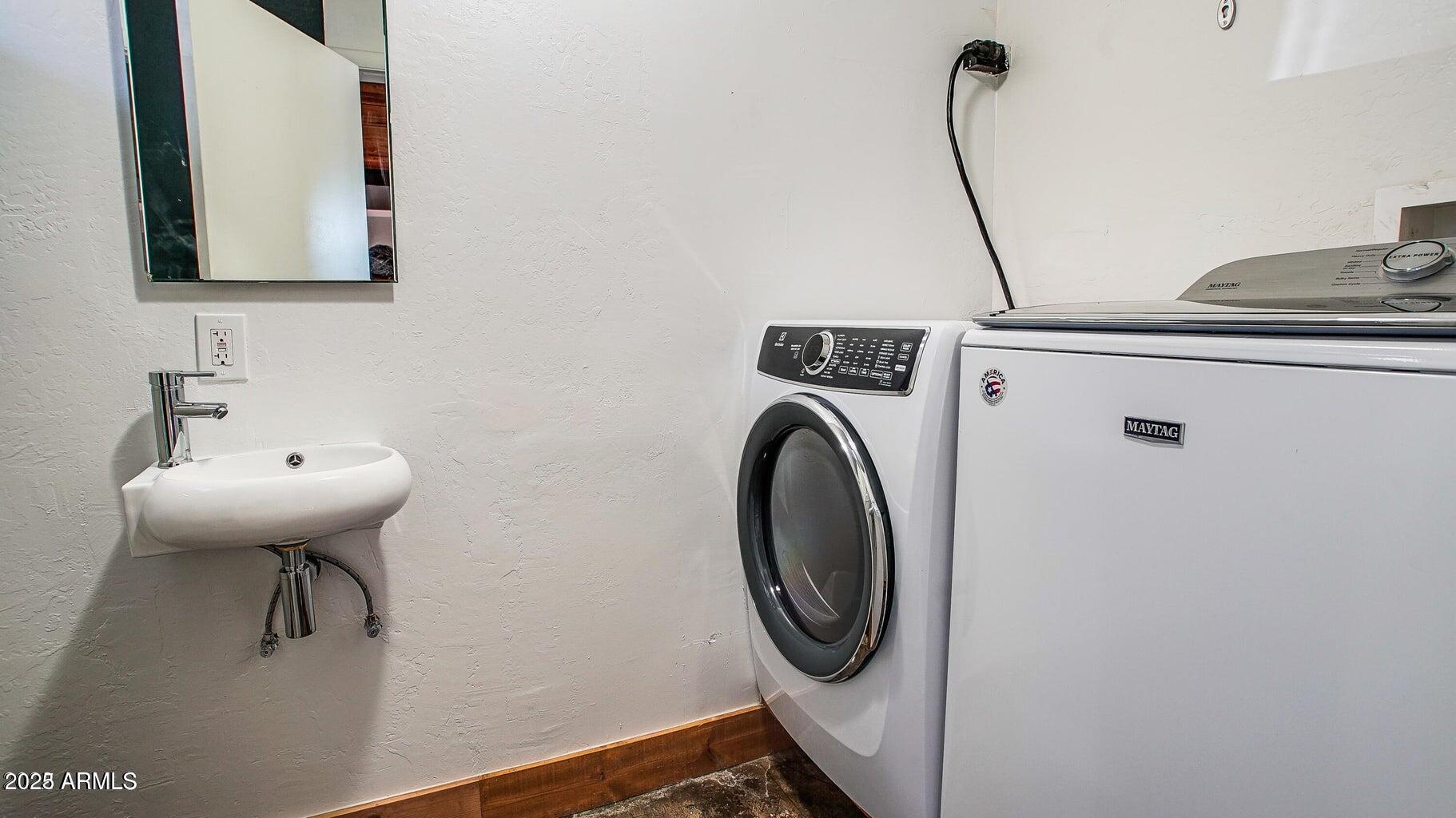 902 West Verde Lane Phoenix, AZ 85013 - Photo 37 of 44 a bathroom with a sink and a mirror