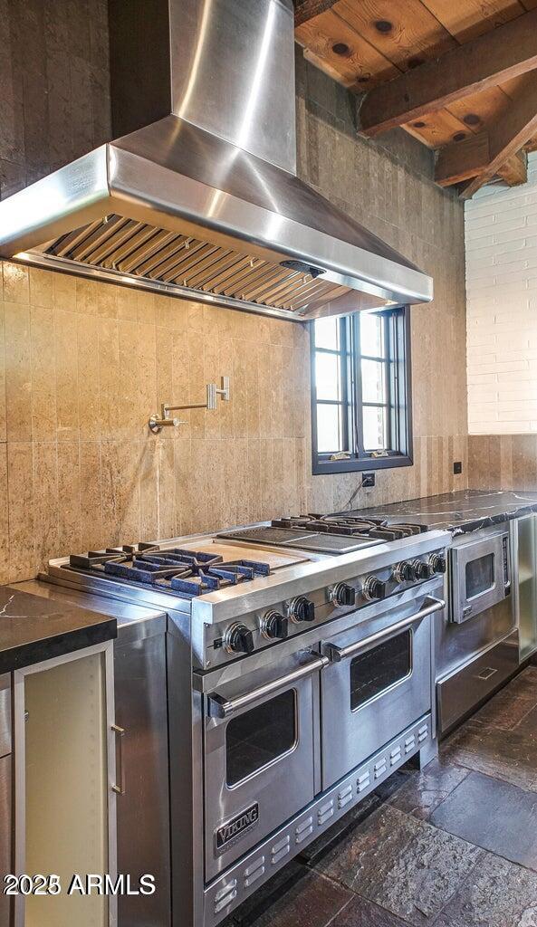 902 West Verde Lane Phoenix, AZ 85013 - Photo 5 of 44 a stove top oven sitting inside of a kitchen