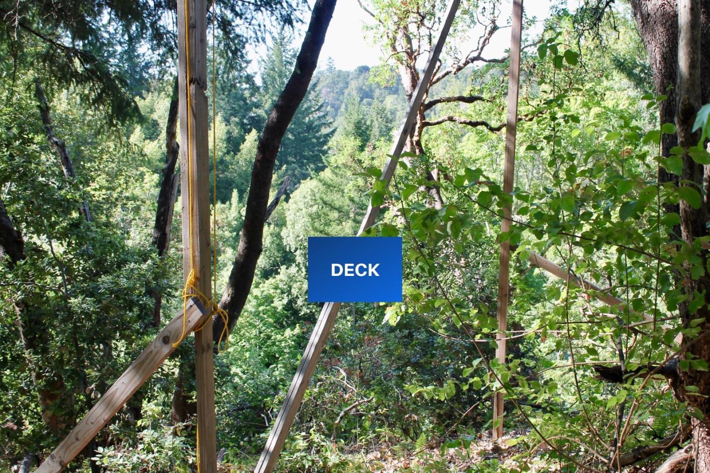 5588 Alpine Road Portola Valley, CA 94028 - Photo 16 of 38 a sign that is sitting in a forest