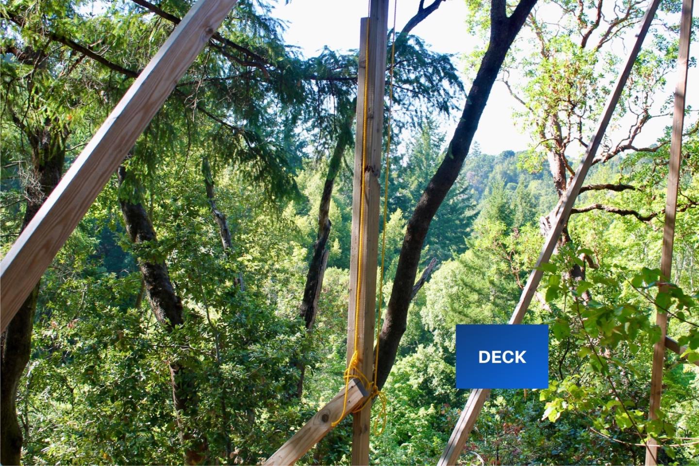 5588 Alpine Road Portola Valley, CA 94028 - Photo 17 of 38 a sign that is sitting in a forest