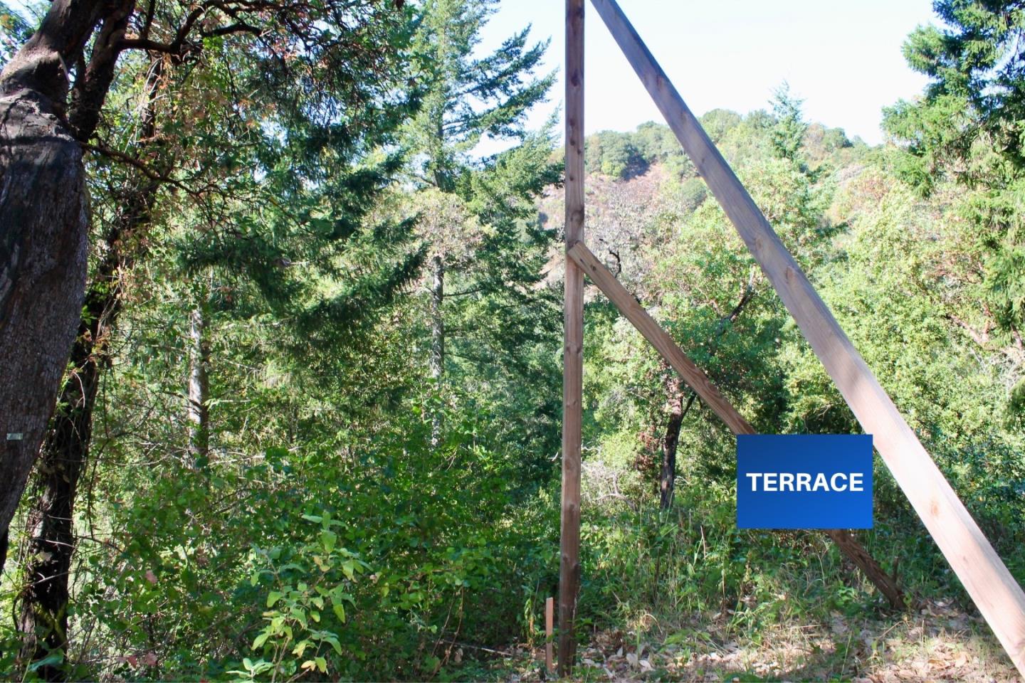 5588 Alpine Road Portola Valley, CA 94028 - Photo 18 of 38 a sign that is on the side of a tree