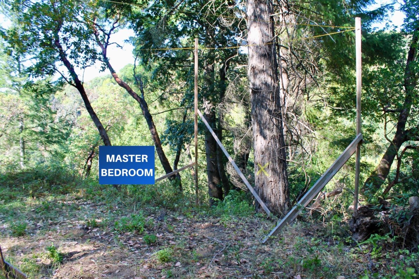 5588 Alpine Road Portola Valley, CA 94028 - Photo 19 of 38 a sign that is sitting on a rock