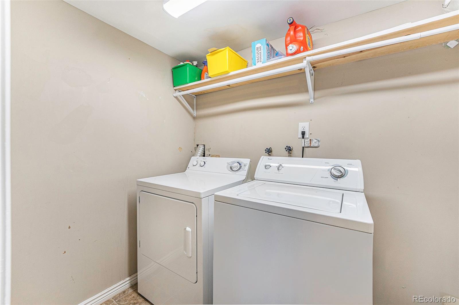 2872 South Gray Way Denver, CO 80227 - Photo 17 of 35 a utility room with dryer and washer