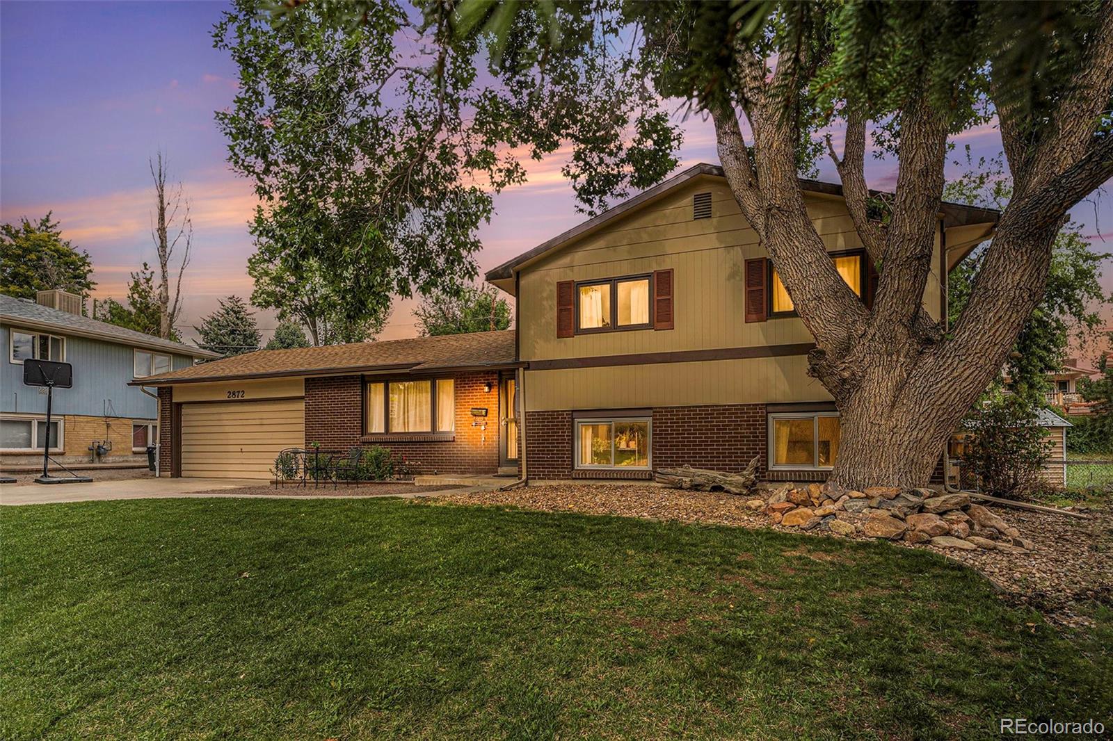 2872 South Gray Way Denver, CO 80227 - Photo 2 of 35 a front view of house with yard and green space