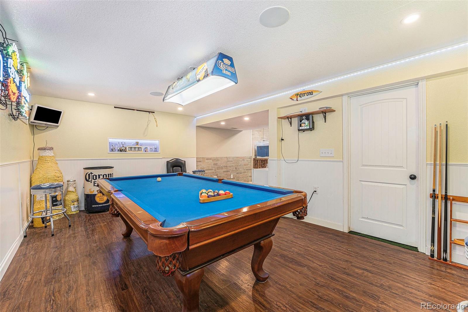 2872 South Gray Way Denver, CO 80227 - Photo 27 of 35 a room with pool table and wooden floor