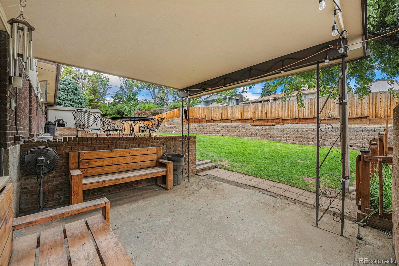 2872 South Gray Way Denver, CO 80227 - Photo 28 of 35 a view of a yard with furniture and outdoor view