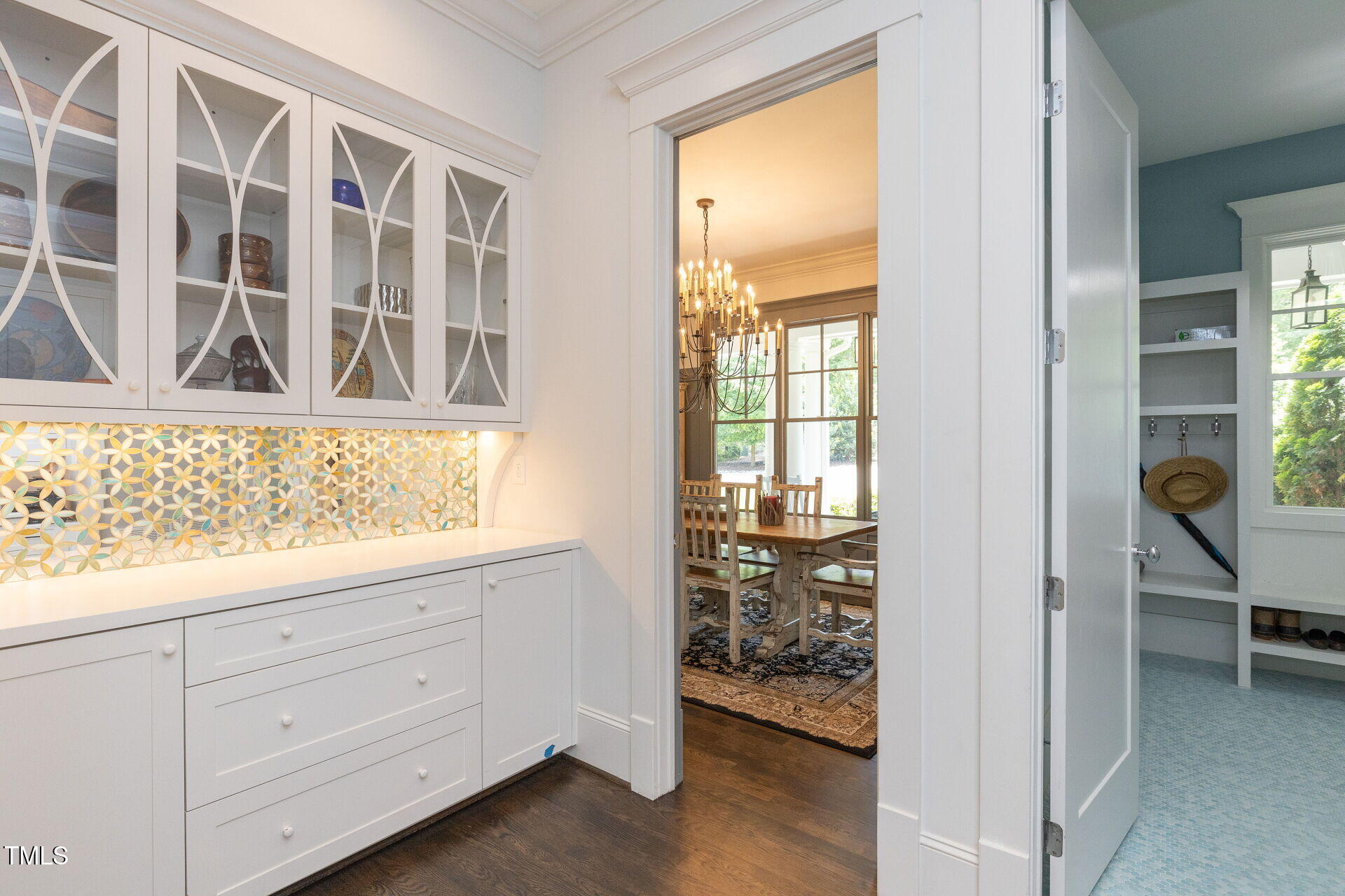 235 Parker Road Chapel Hill, NC 27517 - Photo 14 of 63 a view of an entryway with wooden floor and windows