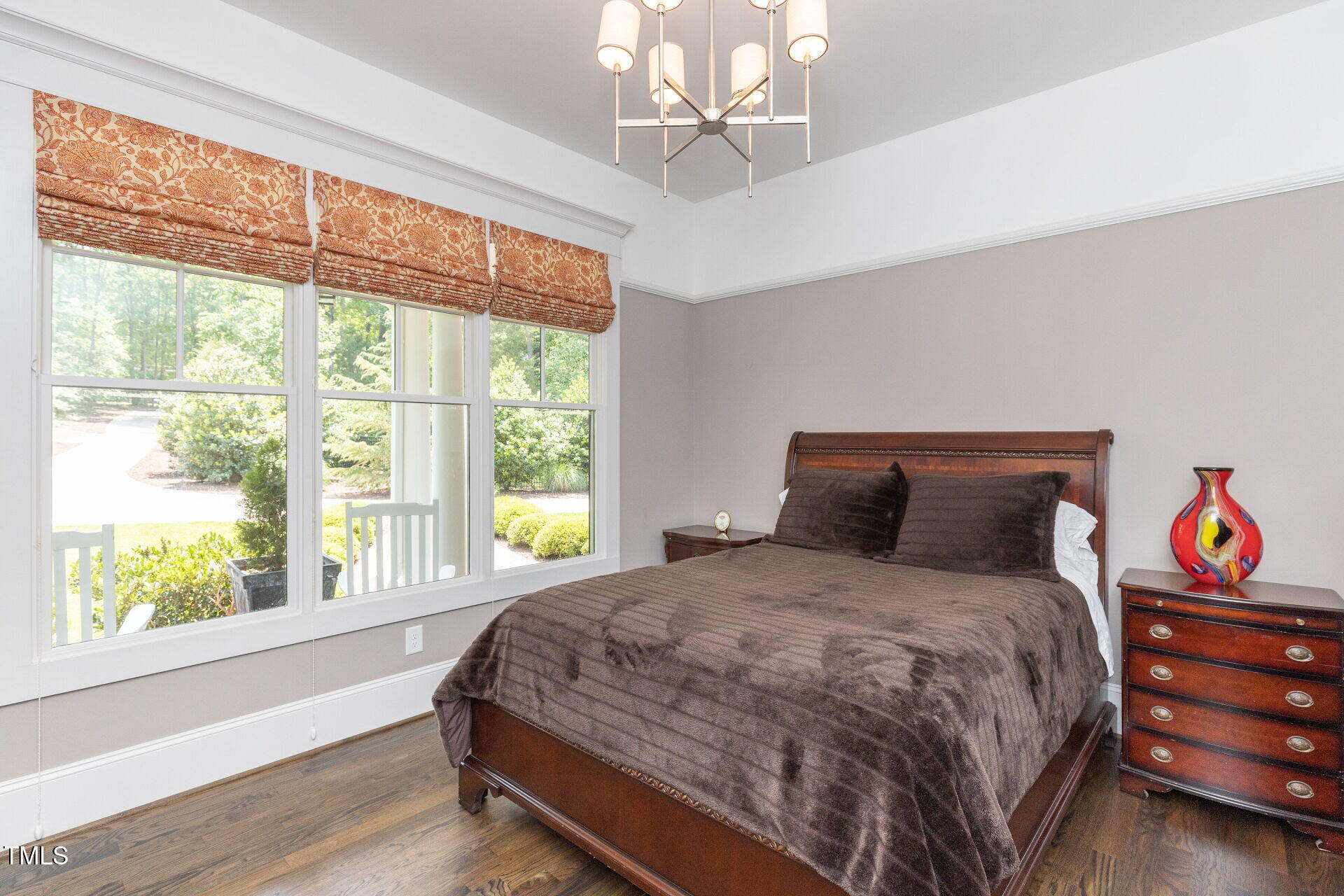 235 Parker Road Chapel Hill, NC 27517 - Photo 17 of 63 a bedroom with a bed and a large window