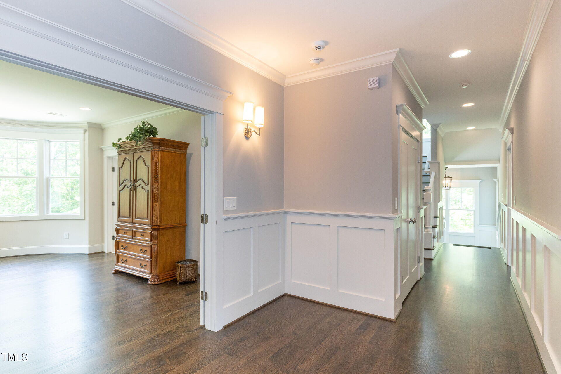235 Parker Road Chapel Hill, NC 27517 - Photo 21 of 63 a view of empty room with wooden floor and fan