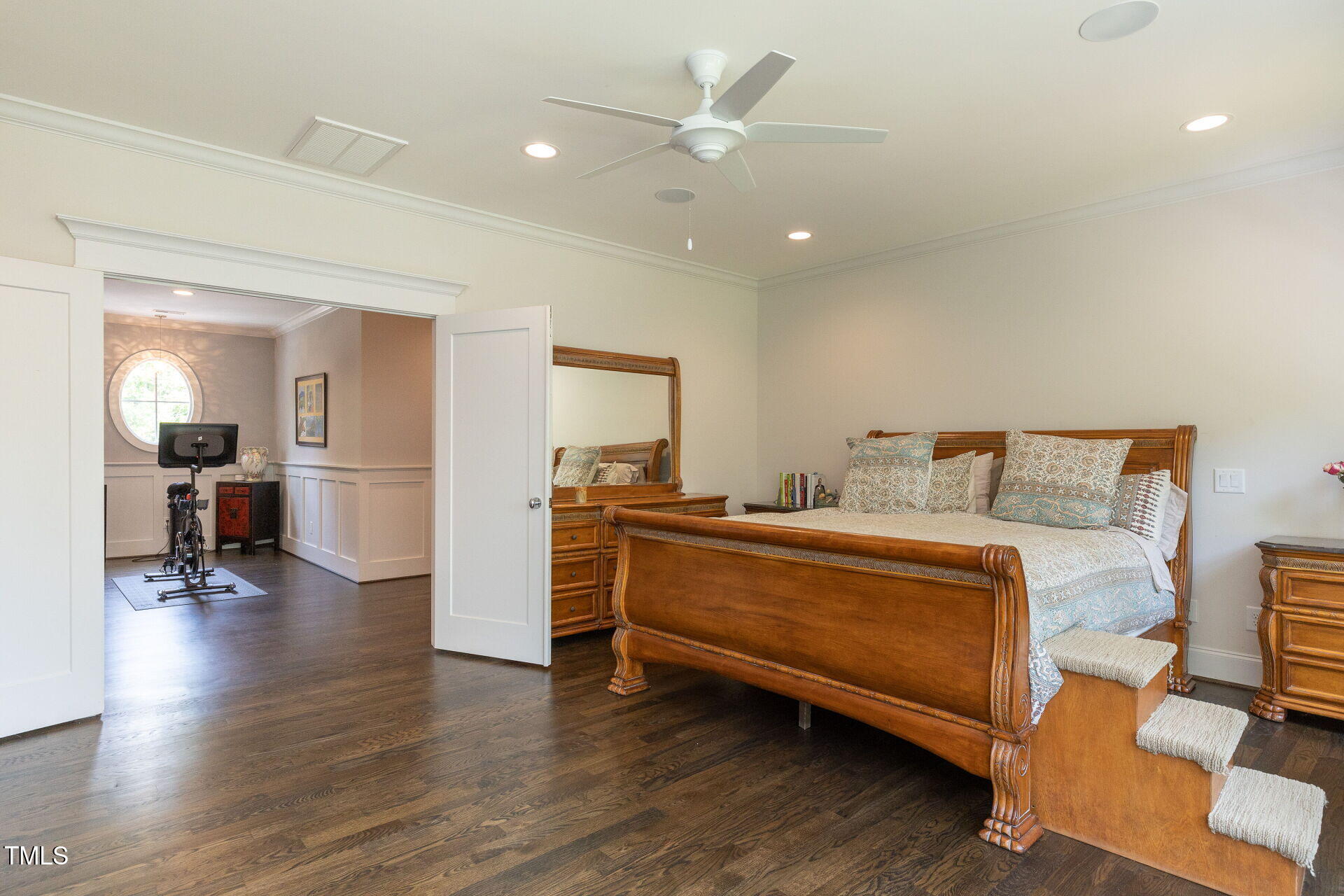 235 Parker Road Chapel Hill, NC 27517 - Photo 23 of 63 a spacious bedroom with a bed and a view of kitchen