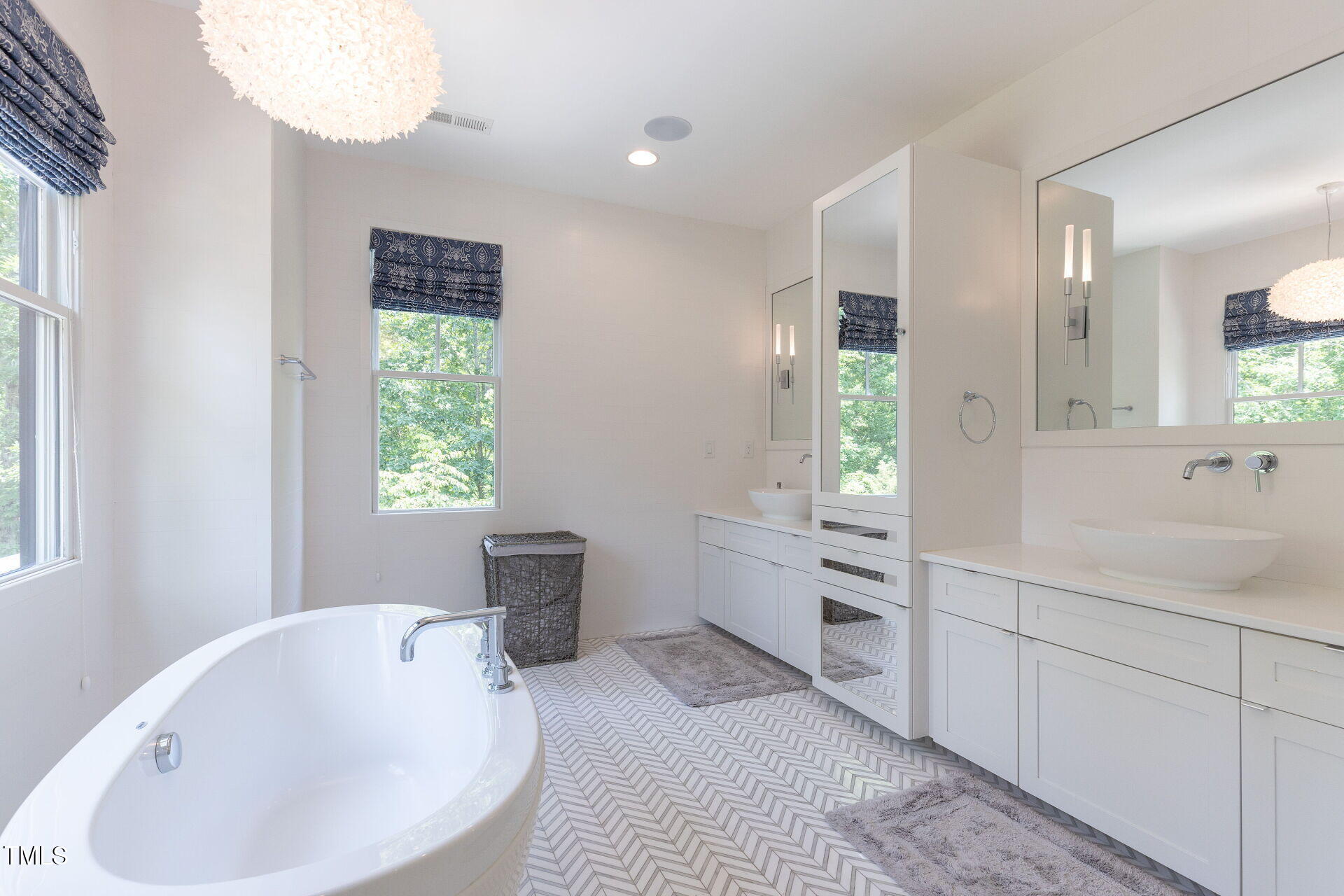 235 Parker Road Chapel Hill, NC 27517 - Photo 27 of 63 a bathroom with a tub sink and window