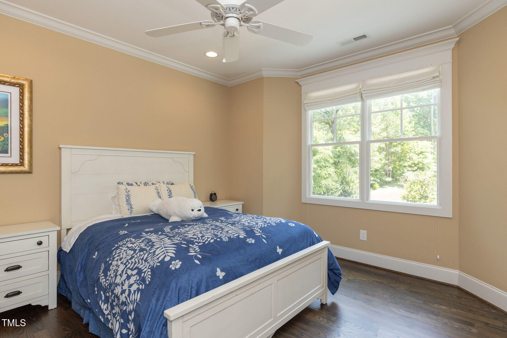 235 Parker Road Chapel Hill, NC 27517 - Photo 30 of 63 a bedroom with a large bed and a window