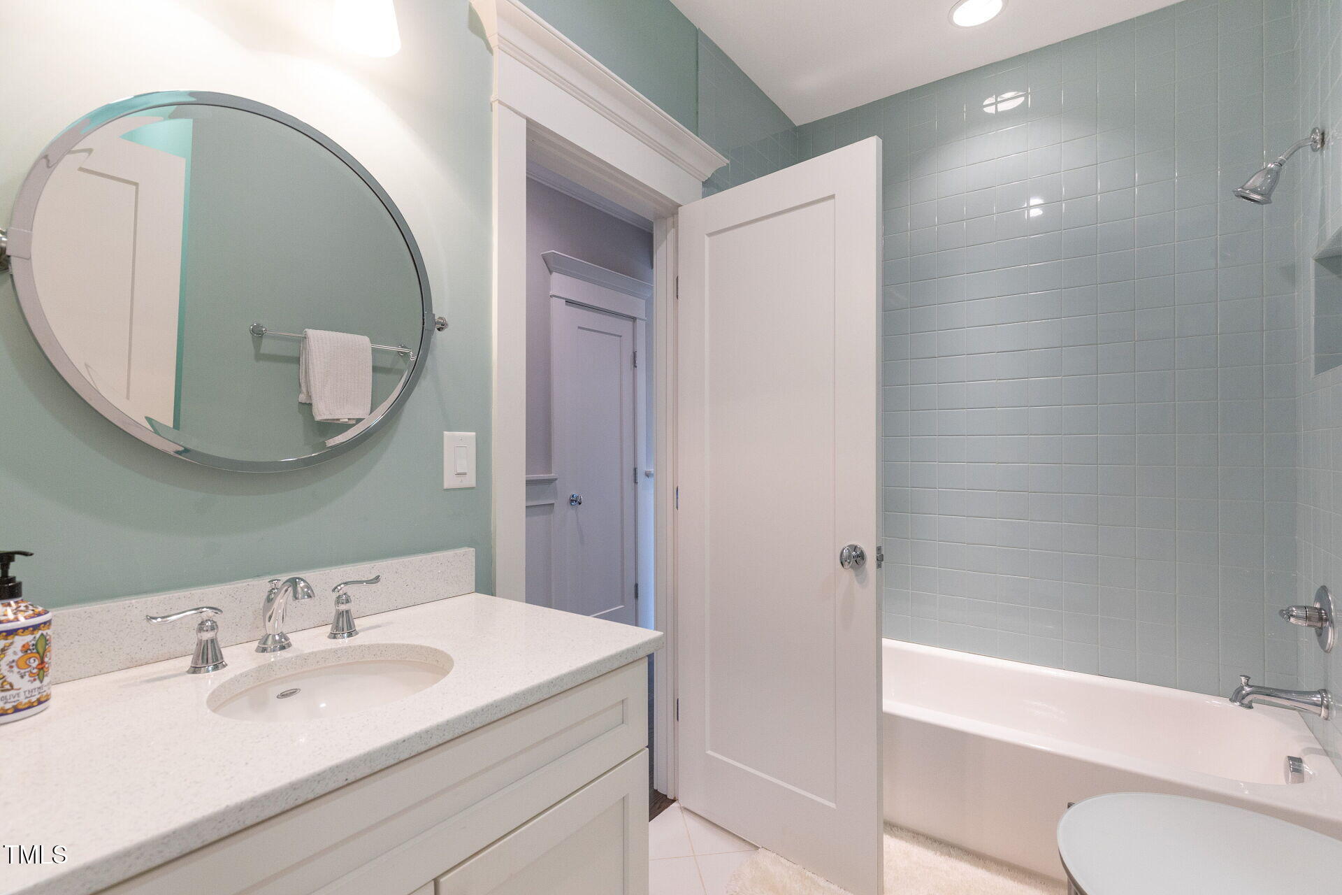 235 Parker Road Chapel Hill, NC 27517 - Photo 35 of 63 a bathroom with a sink toilet and shower