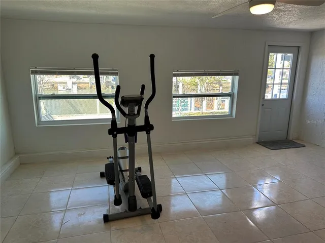 a view of a room with gym equipment