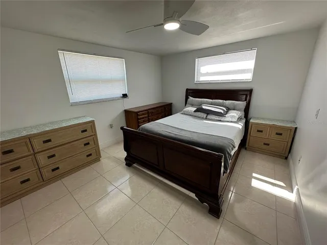 a bed room with a bed and furniture