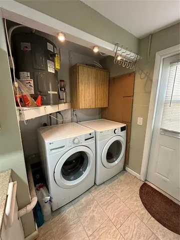 a view of a storage & utility room with washer and dryer