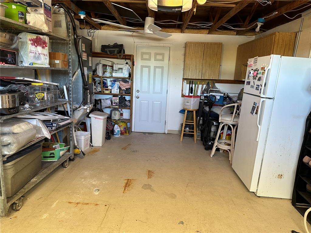 12613 4th Isle Hudson, FL 34667 - Photo 30 of 42 a view of storage and utility room