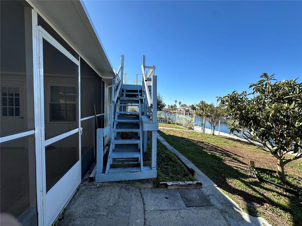 12613 4th Isle Hudson, FL 34667 - Photo 31 of 42 a view of outdoor space and deck