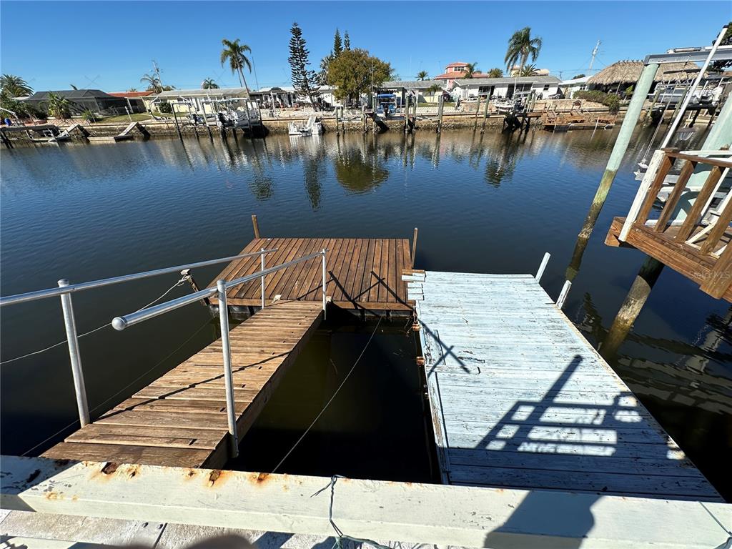 12613 4th Isle Hudson, FL 34667 - Photo 37 of 42 a view of a lake from a balcony