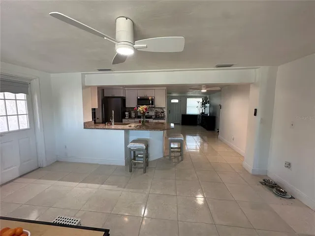 a room with furniture and a window