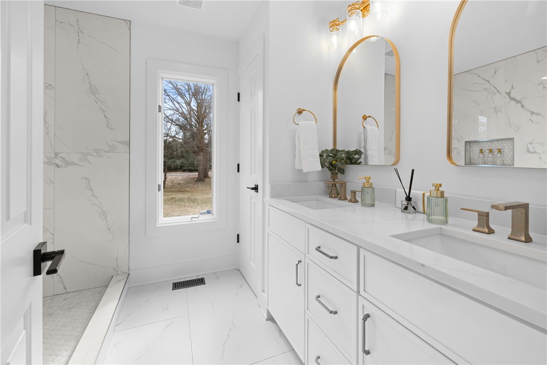 117 Riverpoint Drive Clemson, SC 29631 - Photo 25 of 47 This spacious bathroom features a double vanity and sleek modern finishes, perfect for daily routines.