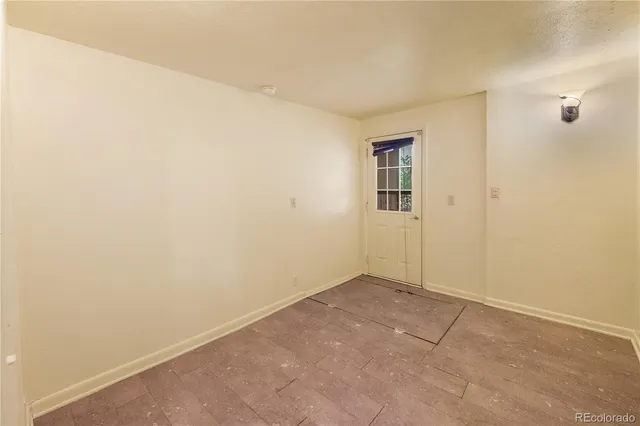 an empty room with windows