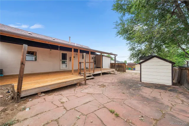 a view of backyard with cabin
