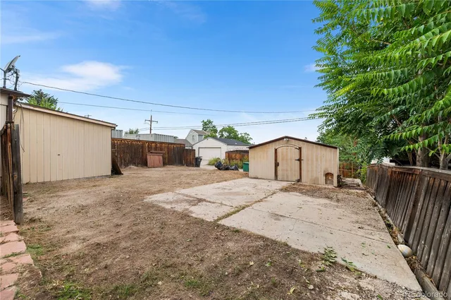 a view of a back yard of the house