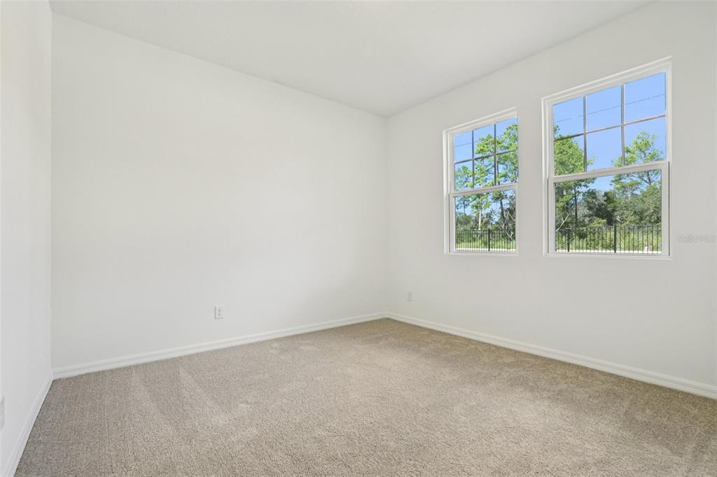 2491 Zuni Road St. Cloud, FL 34771 - Photo 16 of 42 an empty room with a window
