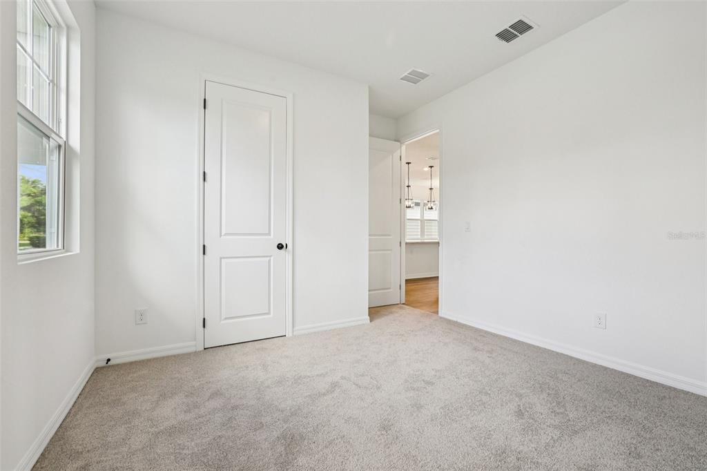 2491 Zuni Road St. Cloud, FL 34771 - Photo 18 of 42 an empty room with windows