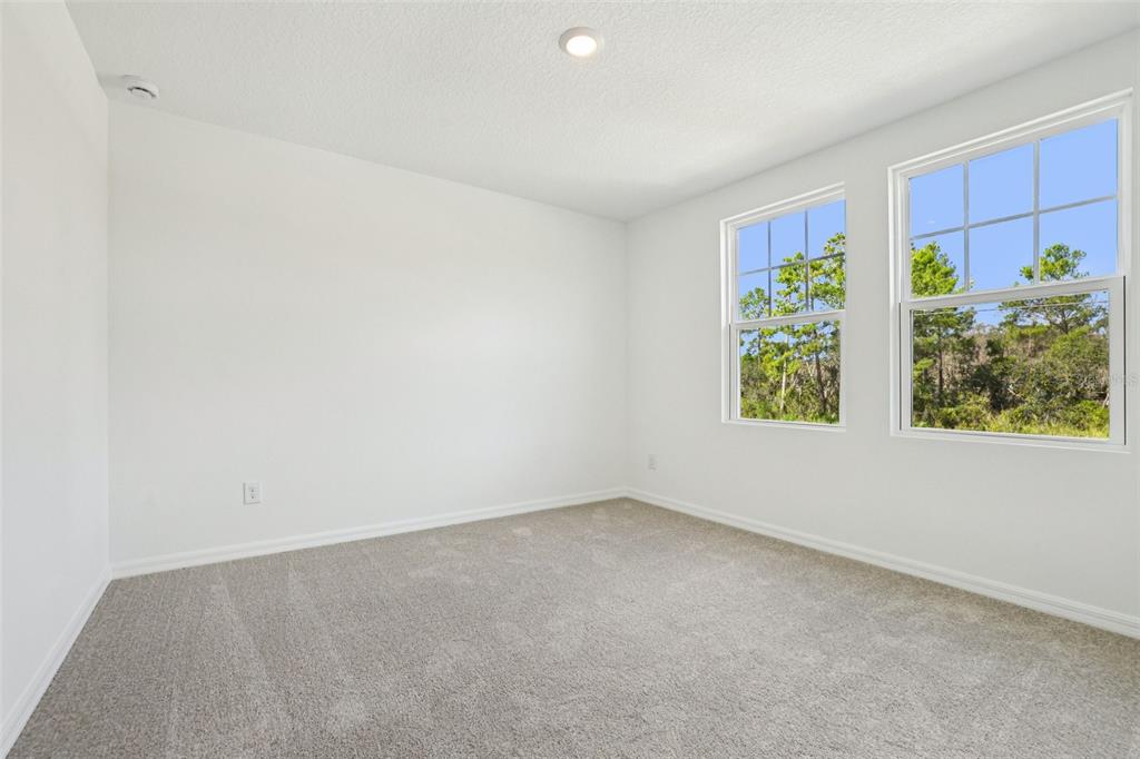 2491 Zuni Road St. Cloud, FL 34771 - Photo 22 of 42 a view of room with window and tree in it