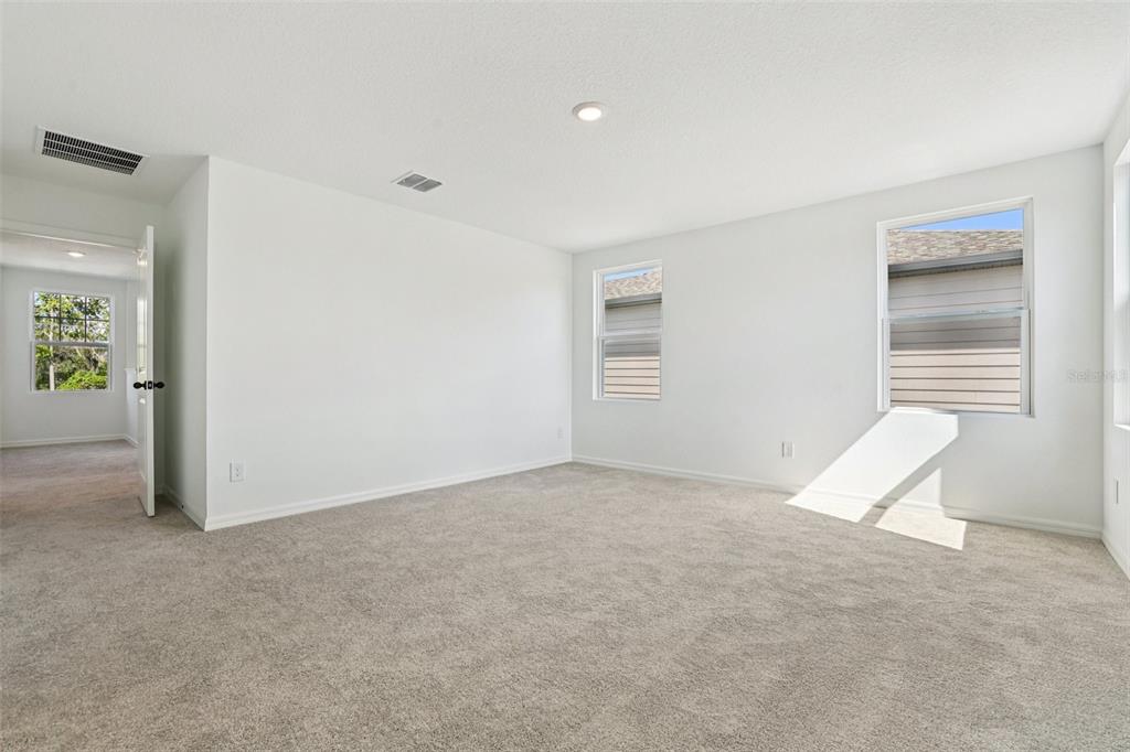 2491 Zuni Road St. Cloud, FL 34771 - Photo 32 of 42 an empty room with windows