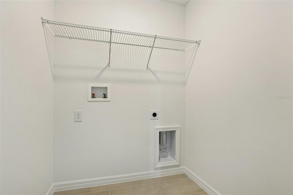 2491 Zuni Road St. Cloud, FL 34771 - Photo 37 of 42 a bathroom with a shower