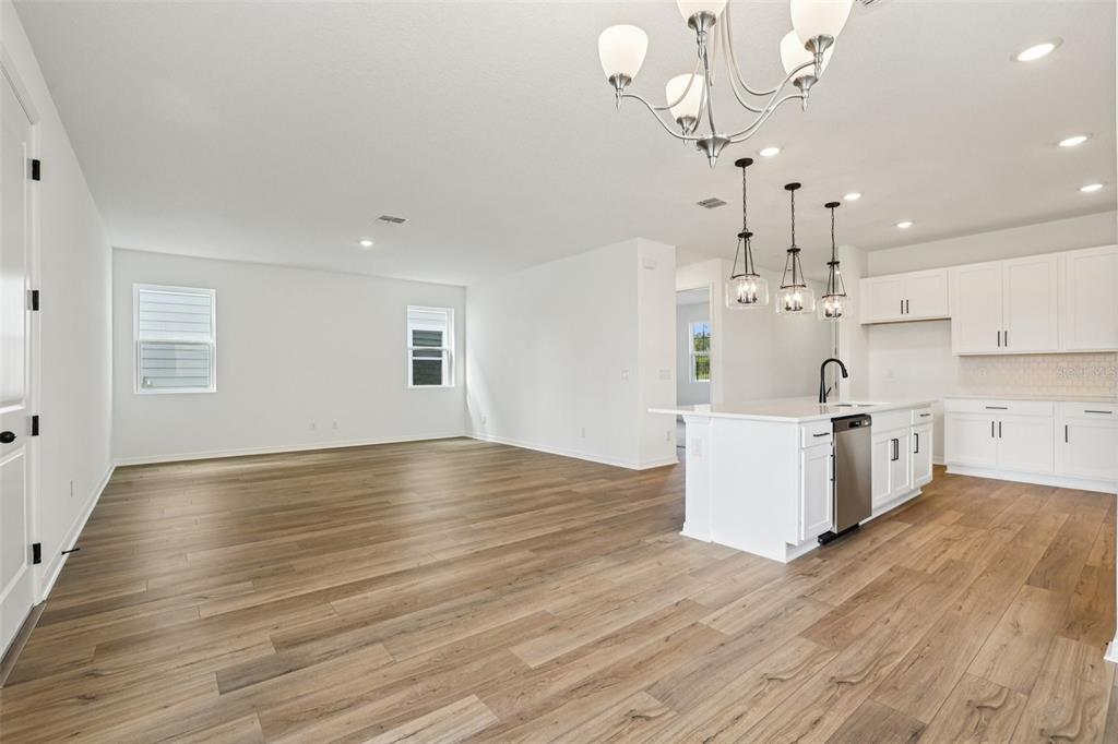 2491 Zuni Road St. Cloud, FL 34771 - Photo 10 of 42 a view of a kitchen with marble kitchen and sink