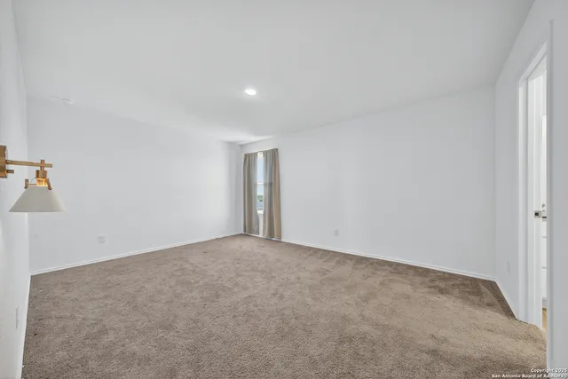 an empty room with an entryway