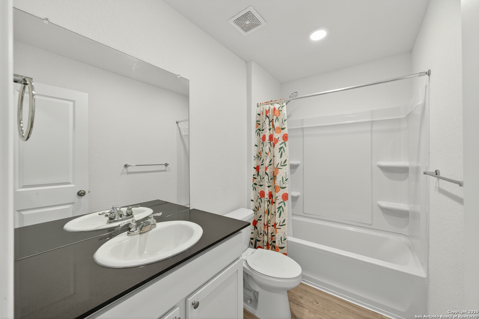 10716 Sweepback Trail Converse, TX 78109 - Photo 20 of 26 a bathroom with a sink toilet and shower